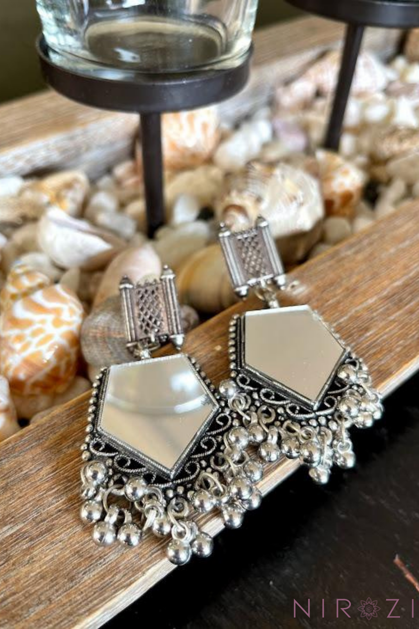 Hand-crafted real glass mirror earrings. Glass mirror jhumka earrings for fun and glamour. Lightweight earrings.