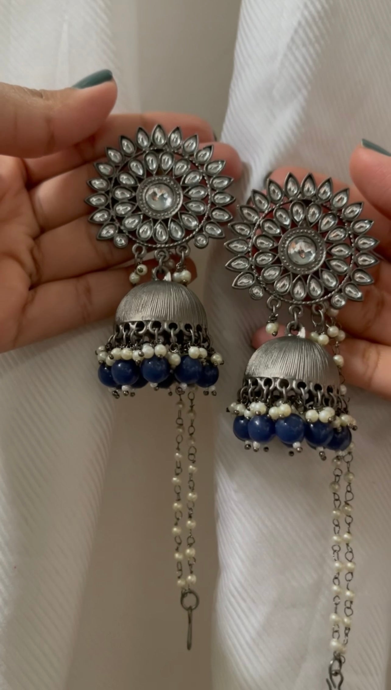Hand-crafted black metal earrings with detachable pearl chain. Available in fun and vibrant colors. Perfect for a simple day-time look. Perfect bridesmaid jewelry and mehndi favors.